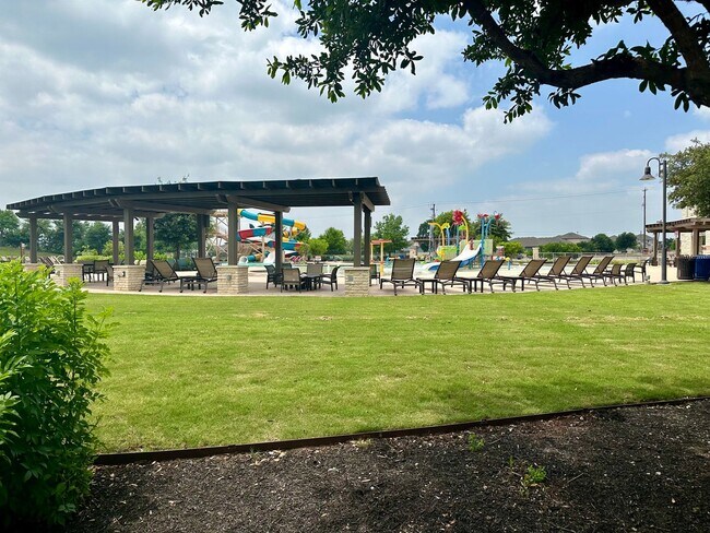 Building Photo - Fantastic Amenities ~ 4/2 Single Story w/ Refrigerator/Washer/Dryer Included ~