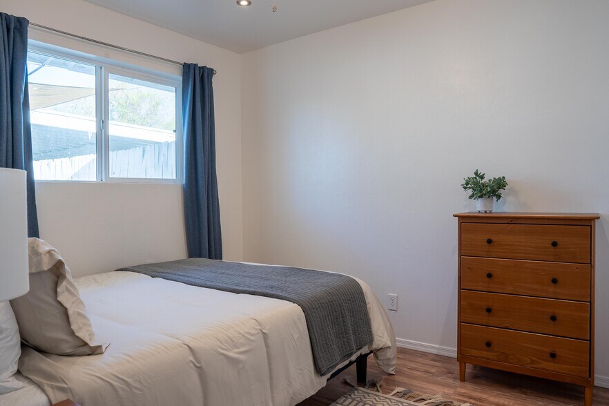 Secondary bedroom w curtains and dresser - 4615 N 14th St