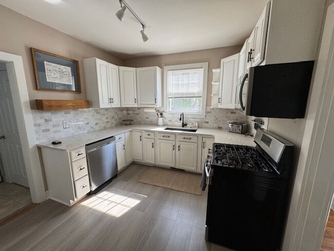 Building Photo - 2 Story Furnished House with Basement