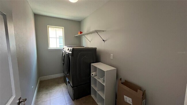 Building Photo - 6031 Roseate Spoonbill Dr