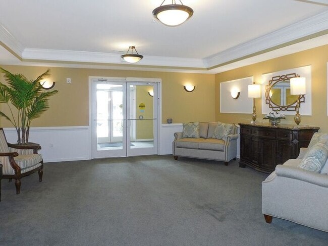 Building Photo - Pet Friendly Condo with Private Balcony and 1 Car Garage