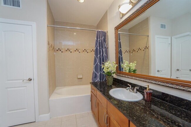 Building Photo - Fully Furnished Sugar Land Town Square Condo – Some Utilities Included