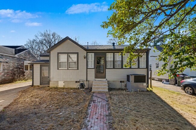 Building Photo - Charming Renovated Home Near U of M – Featuring Expansive Workshop & Garage