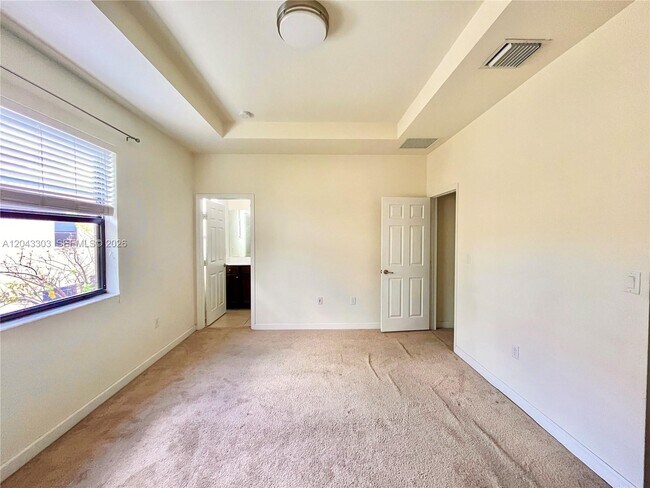 Building Photo - 9271 W 33rd Ln