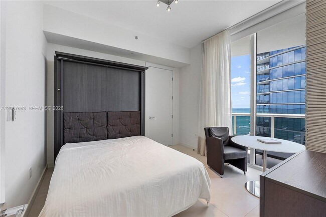 Building Photo - 15811 Collins Ave