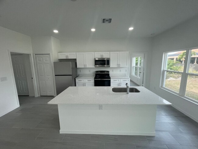 Building Photo - NEW CONSTRUCTION-Spacious 4 Bed / 2 Bath / 2 Car Garage Home in Lehigh Acres