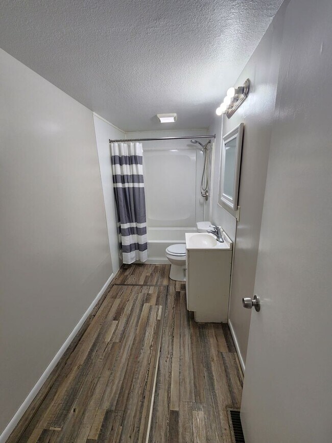 Building Photo - Nice, big, and updated 2BR rancher with full basement, parking off street and carport!