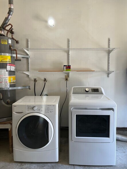 Newer electric W/D in garage. - 2533 Spencer Pl