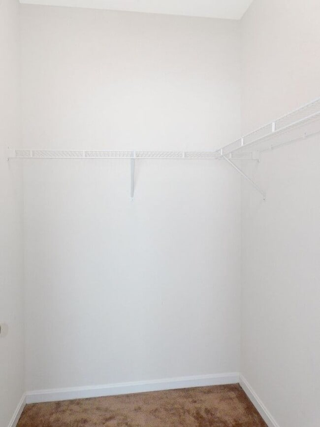 Building Photo - Pet Friendly Condo with Private Balcony and 1 Car Garage