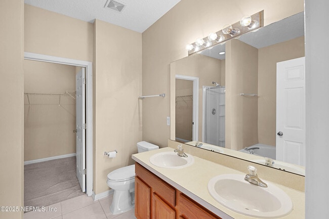 Building Photo - 12301 Kernan Forest Blvd