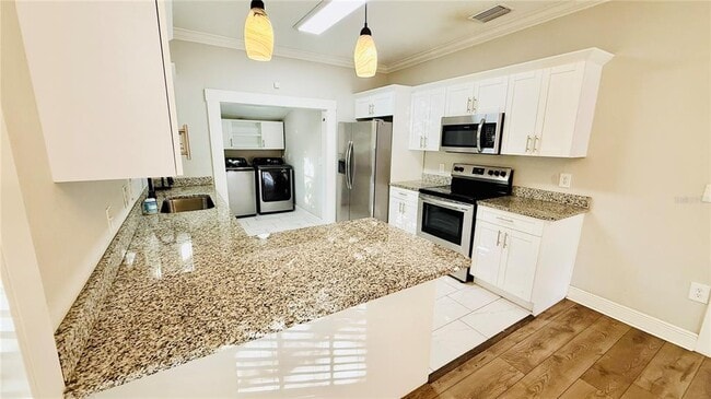 Building Photo - 1210 E 33rd Ave