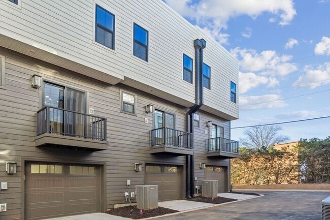 Building Photo - High-End 2BR Townhome | Rooftop Terrace + 2-Car Garage | 24-Unit Community