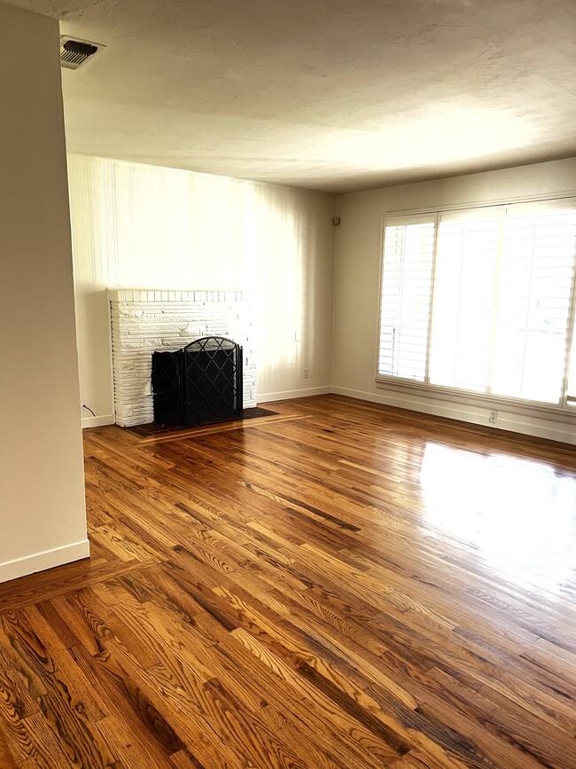 plantation shutters in Living Room look out to front yard (nice spot for work-at-home set up) - 3731 San Ysidro Way