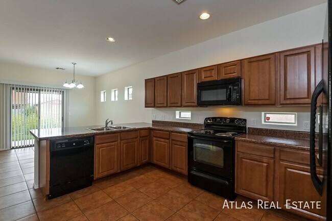 Building Photo - 6650 S Blue Wing Dr