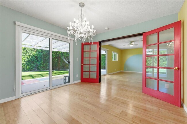 Building Photo - 3 bed / 2 Bath Mid-Century Home with Two-Car Garage, Soaking Pool and Manicured Backyard!