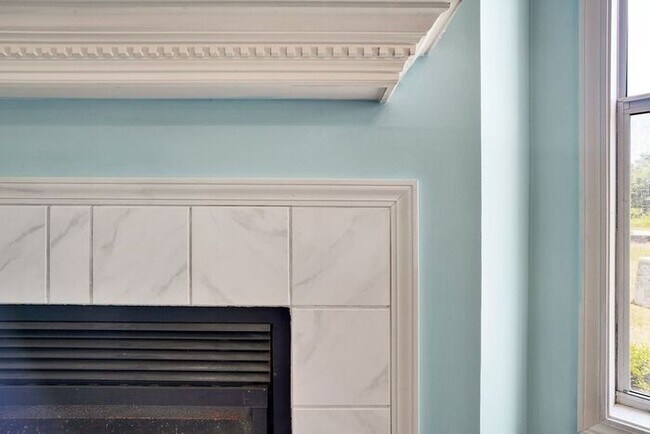 Building Photo - Furnished! Breezewood ground floor unit, Open floor plan, fire place, patio, large closets, wood ...