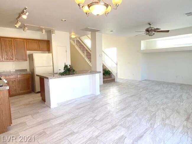 Building Photo - Gated Community! Fabulous 4 Bedrooms Plus Large Loft. One Bed and Bath Downstairs.