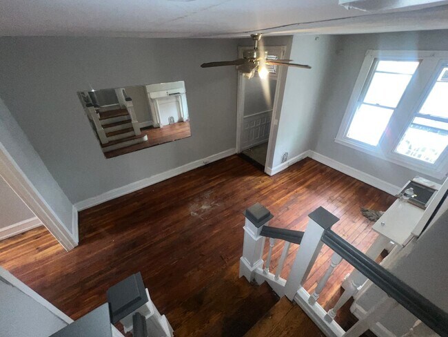 Building Photo - Oversized Classic Row Home w Wood Floors a...