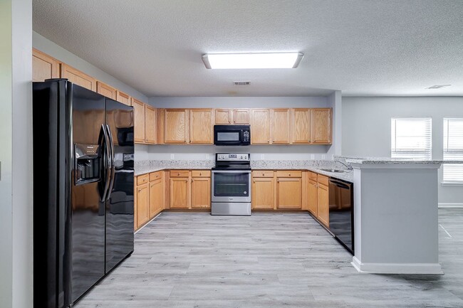 Building Photo - Spacious & Beautifully Maintained 5BR/3BA ...