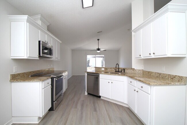 Building Photo - Coming March 14th — Stunning 4-Bed, 2-Bath Sunset Estates Home with Open-Concept Living, Chef’s K...
