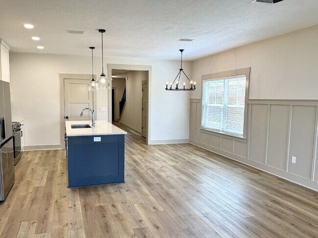 Building Photo - Need Space?  How about 5 bedrooms, 2.5 baths + an extra bonus area upstairs so that the kids can ...