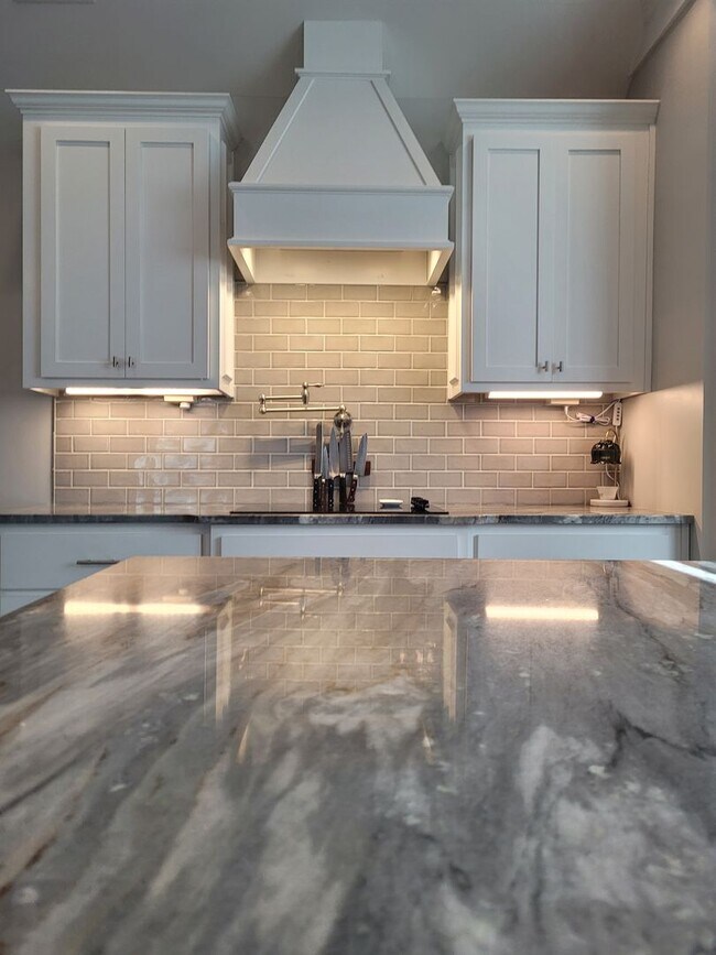 Building Photo - Spacious 4BR Home with Inground Pool, Open Split Floor Plan & Side-Entry Garage