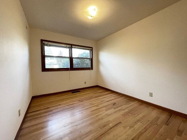 Building Photo - Charming Mid-Century Ranch with Large Yard and Attached Garage