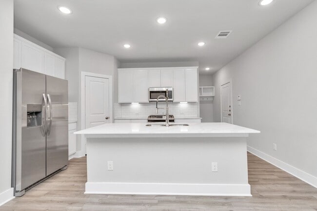 Building Photo - Welcome to the Redbud — A Fresh Take on Modern Living.