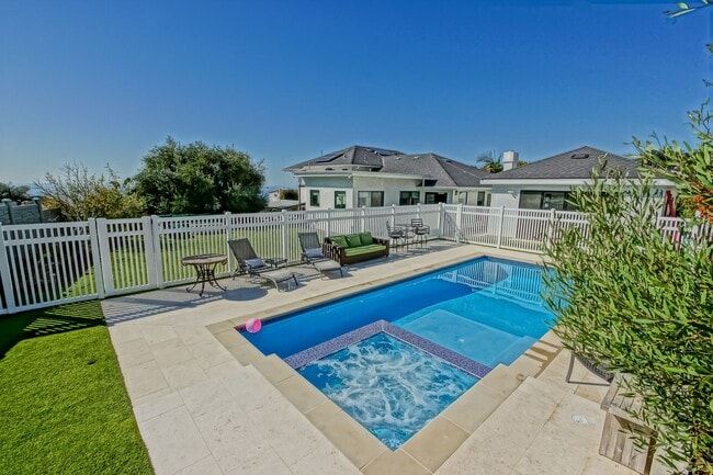 Building Photo - Beautifully Remodeled, Bright & Modern 4BR3BA Home w/ 2BR1BA Guest House On Sprawling Corner Lot ...