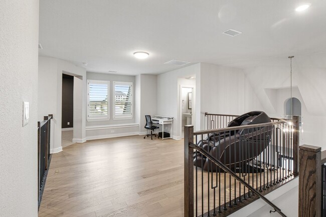 Building Photo - Stunning 4-Bedroom Luxury Residence with Bonus Office in the Prestigious Walsh Community LIKE NEW!