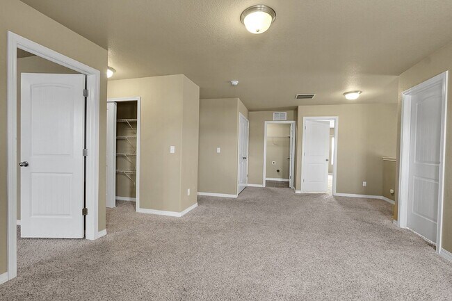 Building Photo - $2,490.95 - 4 Bed, 2.5 Bath Home in CO Springs with Fenced in Yard and 3 Car Garage!