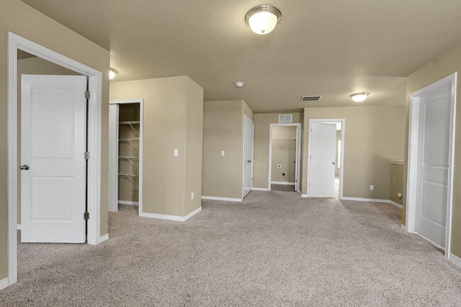 Building Photo - $2,540.95 - 4 Bed, 2.5 Bath Home in CO Springs with Fenced in Yard and 3 Car Garage!