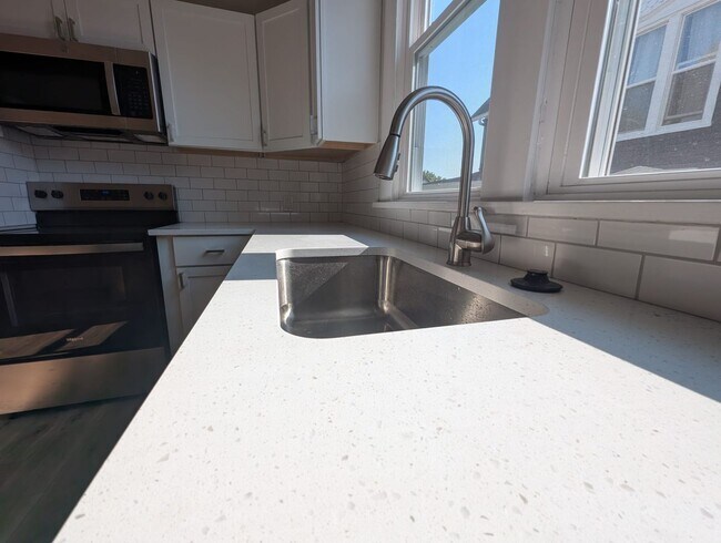 Building Photo - Remodeled 2-Bedroom Home with Main Floor Laundry & Two Car Garage