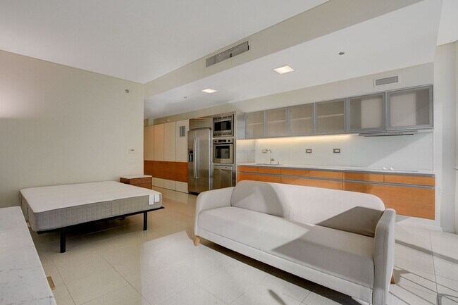Building Photo - Stunning Strip Views from this Fully Furnished Studio Residence.