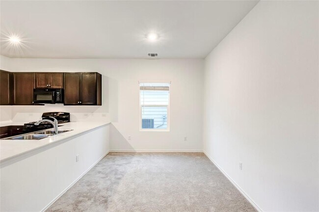 Building Photo - 7706 Poppy Petal Dr