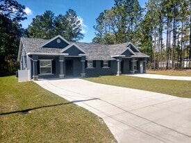 Building Photo - 9428 N Travis Dr