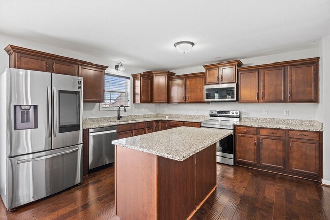 Building Photo - Move-In Special Available! Spacious 3BR Home with Bonus Room, Fireplace & Fenced Yard