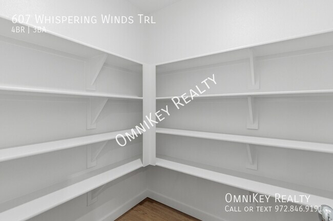 Building Photo - 607 Whispering Winds Trl