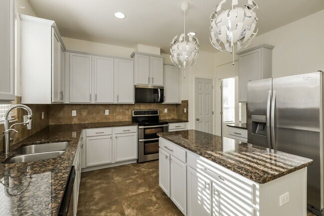 Building Photo - 5594 Angelonia Terrace