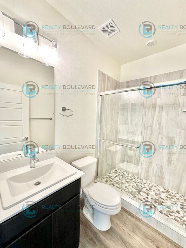 Building Photo - Modern 2 Bedroom 2Bath Townhome with Dual Patios & Designer Finishes near Truckee River