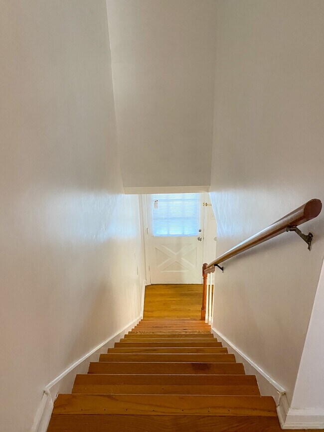 stairs up to second floor - 506 N Greensboro St