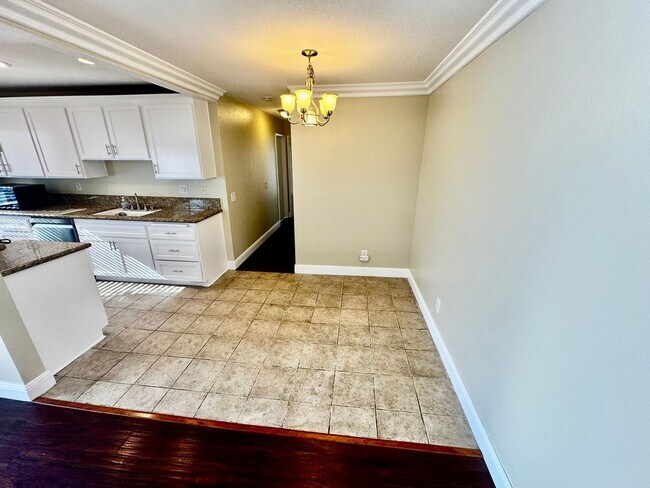 Building Photo - Updated 2nd Floor Corner Unit -3425 E. 15t...