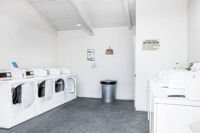2 laundry rooms, each with 4 washers and dryers - 250 E San Jose Rd