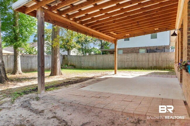 Building Photo - 8254 Magnolia Village Dr N