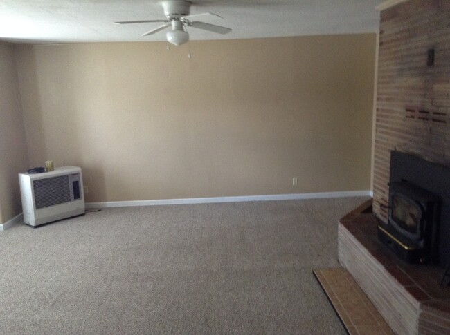 Large living room. Enough space for two couches and a recliner or two. - 24 N K St