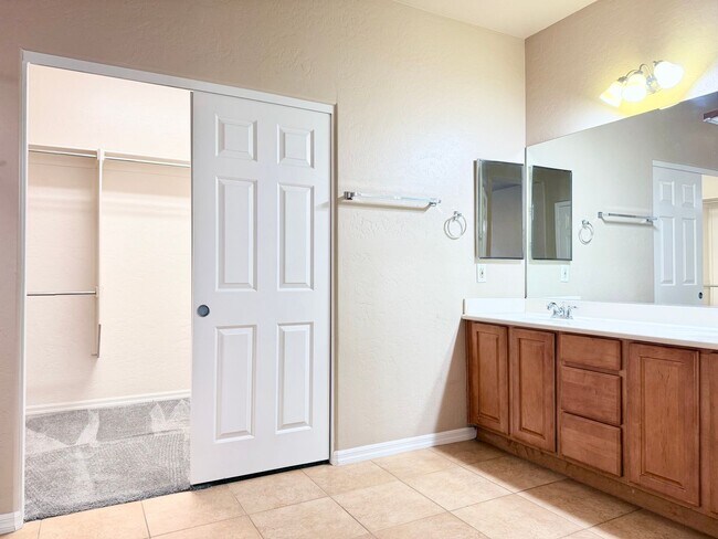 Building Photo - FIVE BEDROOMS, THREE FULL BATHROOMS, THREE...