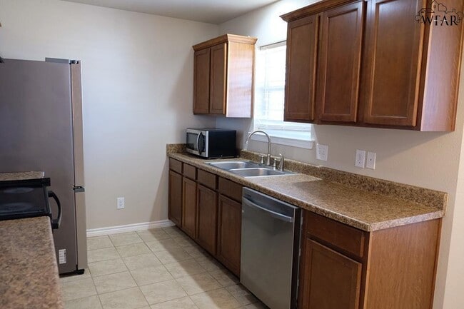 Building Photo - 5027 Cy Young Dr