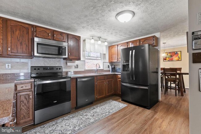 Building Photo - 7874 Butterfield Dr