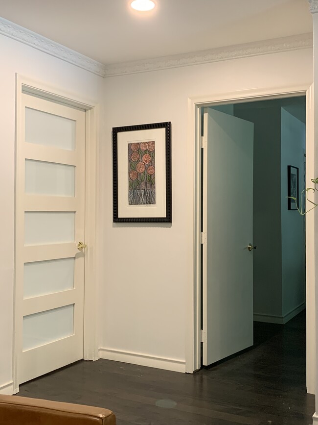 Door to powder bathroom and multipurpose room - 6234 Bandera Ave