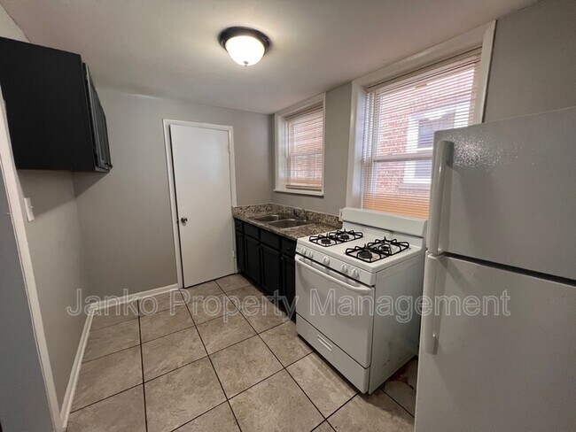 Building Photo - 8137 S Evans Ave